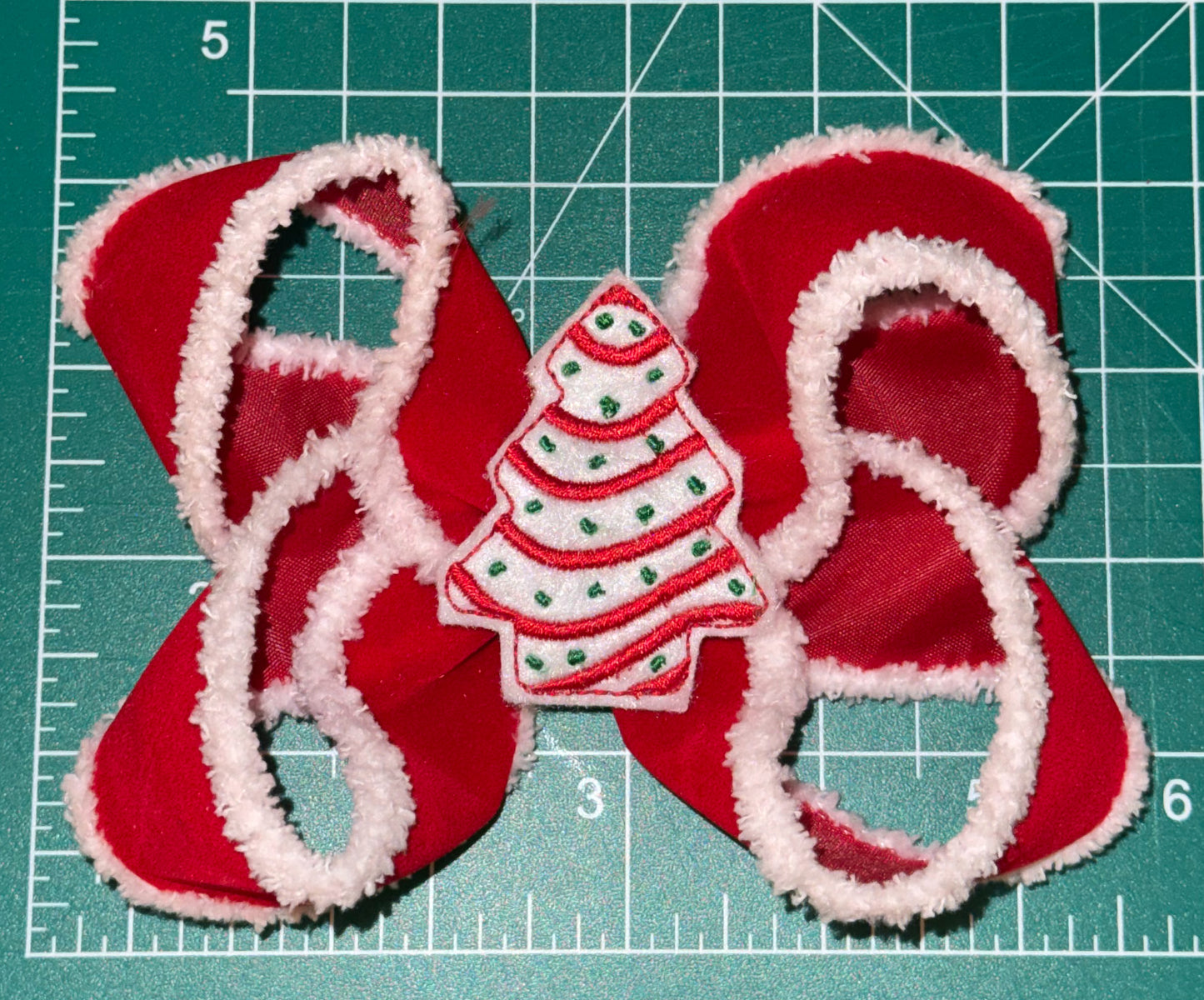 Santa Fur Bow with Little Debbie Cake